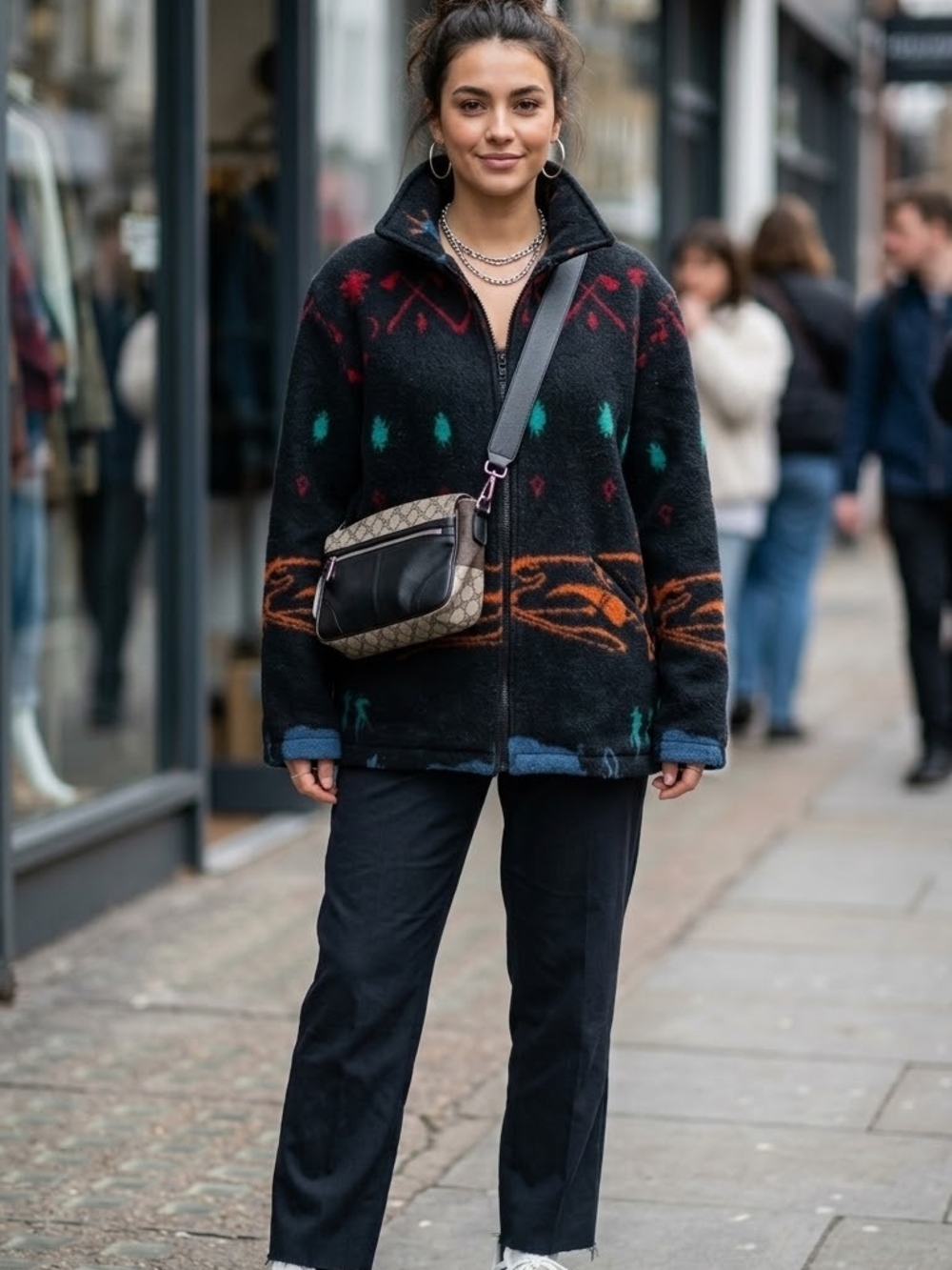 Circle T Black Ski Jacket with Orange, Teal, and Red Accents